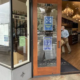 the entrance to a wine shop