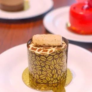 three desserts on plates