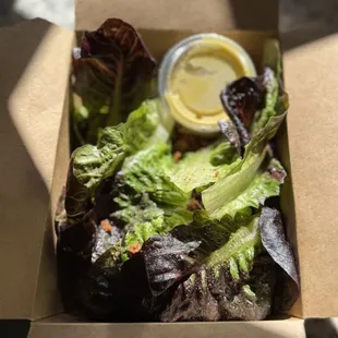 Little gem lettuce salad with a Dijon vinaigrette.