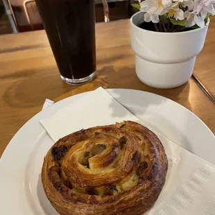 Iced organic coffee and raisin danish