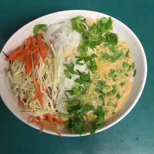 Ground pork red curry noodle bowl (khan poon nam moo) one of many different daily specials!