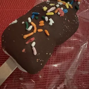 Chocolate covered marshmallow on a stick