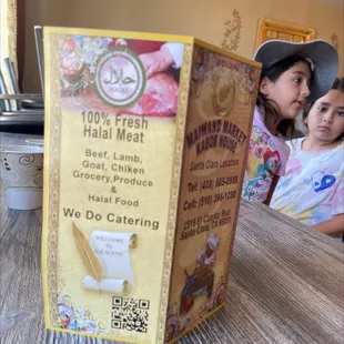 two children sitting at a table