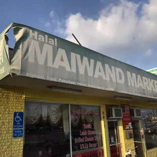 The front is a bit weathered, but I'll take the great prices and food value over updated signage.