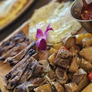 NY steak and eggs... I think.