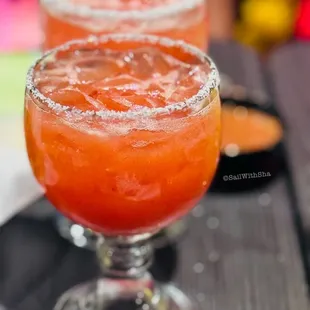 two margaritas on a table