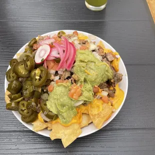 Loaded nachos y asada