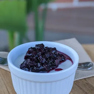 Tembleque - coconut custard with blueberry sauce