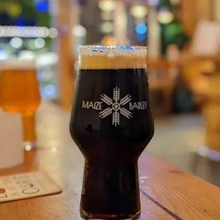 a glass of beer on a table