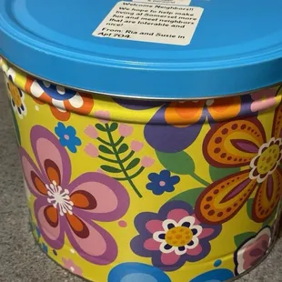 Maise Popcorn Company came out blazing with this psychidellic colored and groovy flower powered tin!