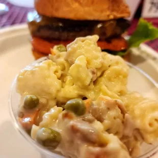 a hamburger and macaroni salad