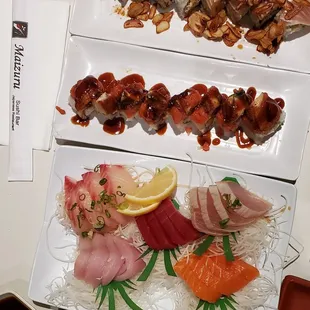a variety of sushi and sashimi
