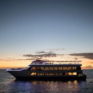 a cruise ship at sunset