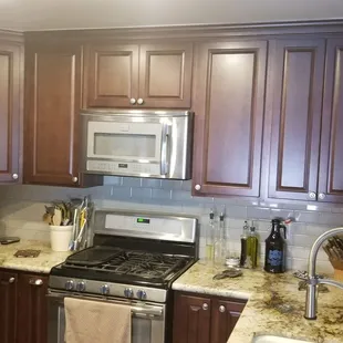 a kitchen with stainless steel appliances