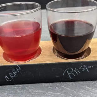 two glasses of wine on a tray