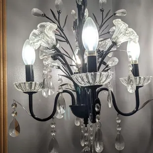 a crystal chandelier with five lights