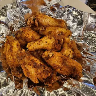 a plate of chicken wings