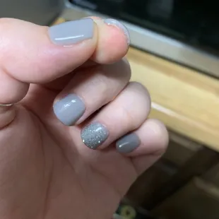 The excess hardened dip is stuck to the side of my index finger.