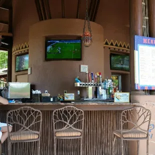 a woman sitting at the bar