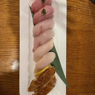 a plate of sashi and sashi