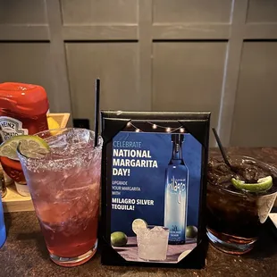 a drink and a menu for national margarita day