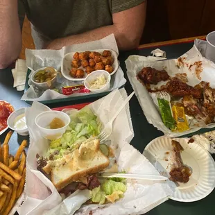 Brats and beer.  Major bacon  and Cheeseburger. Wings. The ranch is amazing!!   I love this place. Heck yes to the G's!