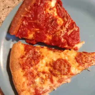 Slice of Chicago next to beer batter crust