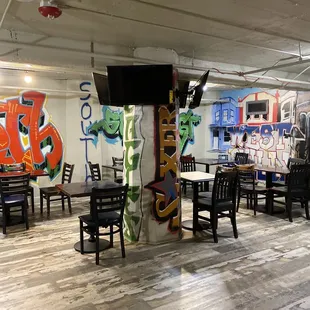 Downstairs seating area with awesome art