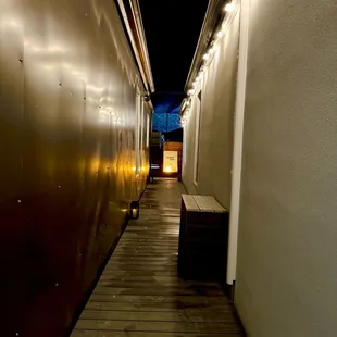 a long narrow hallway with benches