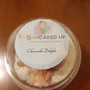 a cupcake in a plastic container