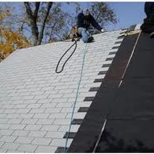 a man working on a roof