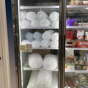 Large bag of ice lasts longer and stays colder than the ice machine at the harbor.