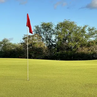 a red flag on the green