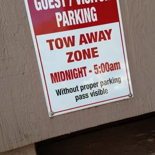 Tow away zone sign