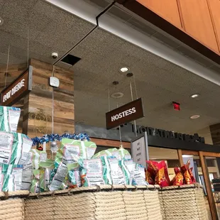 Wait for host to show your ID and vaccine card