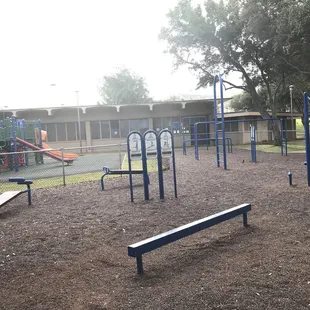 Picture of the kids playground and the workout area.