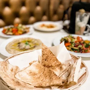 a plate of pita chips on a table