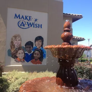 Main entrance, Kaiser water fountain and mural