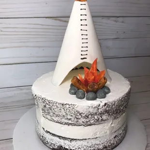 Teepee themed, chocolate naked cake.