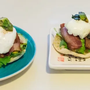 a plate of sandwiches and a plate of eggs