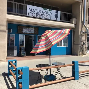 a table and umbrella
