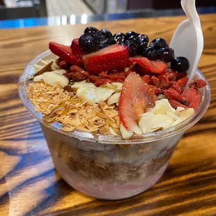 a yogurt with fruit and granola