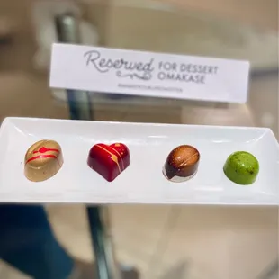 Peanut Butter and Jelly truffle, caramel truffle, s'mores truffle, and key lime pie truffle