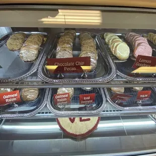 a display of cookies and pastries