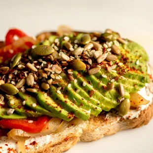 Avocado Toast:
FETA CHEESE  ESPELETTE  CRUNCHY SEEDS  ROASTED RED PEPPER  CARAMELIZED SHALLOTS