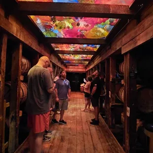 Barrel Room with artistic glass ceiling, smells fantastic. There should be a tour where you can nap in that room.