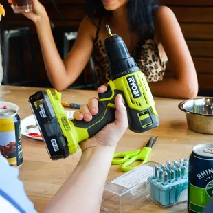 Power drills and cocktails. What could be better?