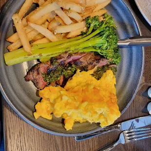 Skirt steak with French fries, broccolini, scramble eggs w/cheese.  The breakfast was great and very filling.  Steak was cooked just right