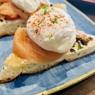 a plate of smoked salmon and poaches