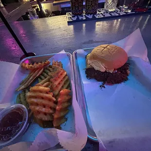 two trays of food on a table